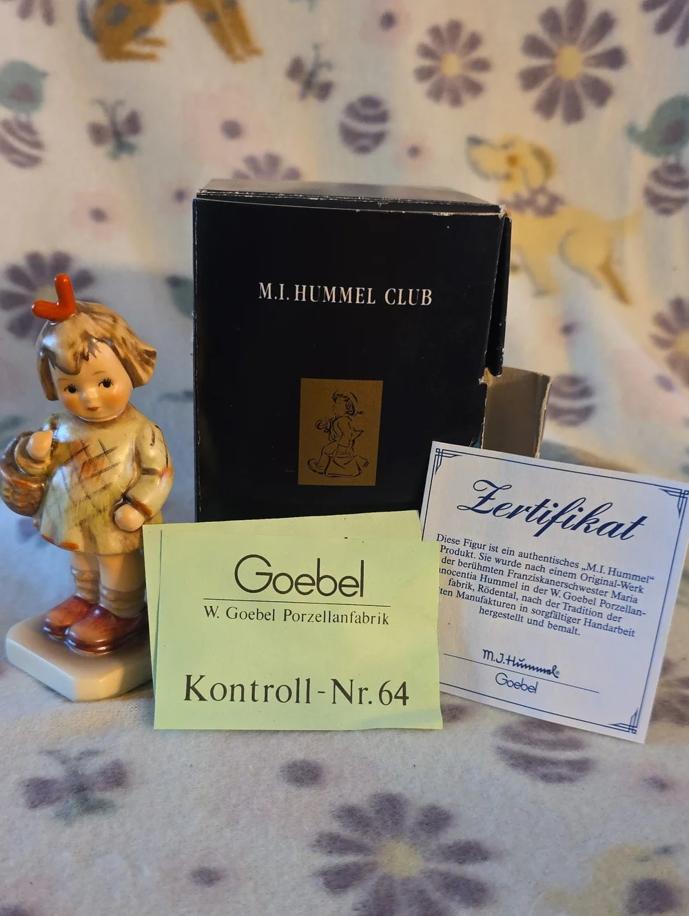 This is a Goebel Hummel figurine titled 